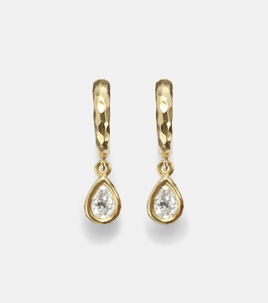 Hidden Gem 18kt gold huggie earrings with diamonds