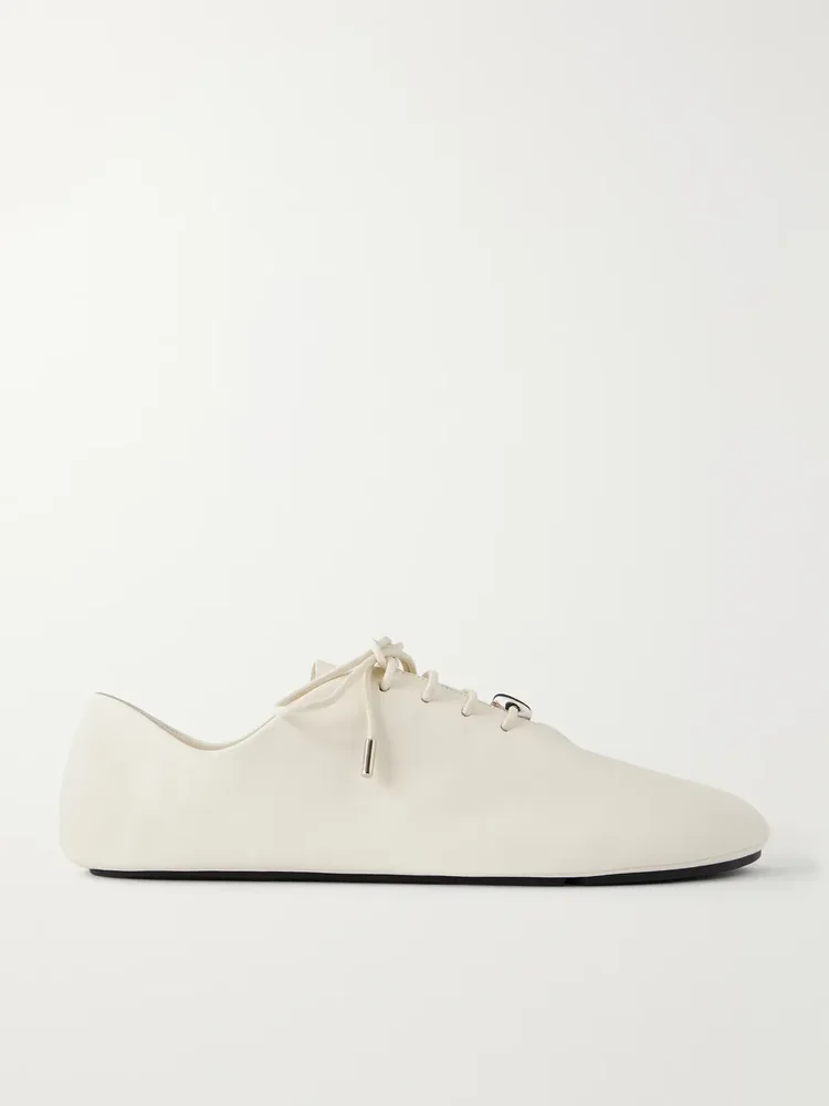 Pebble embellished leather sneakers