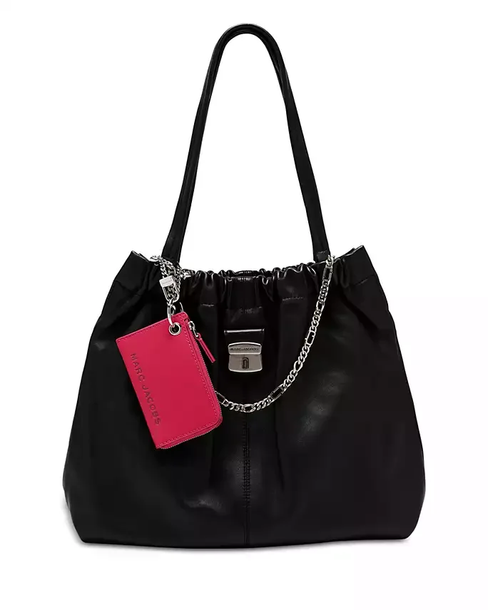 The Coin Charm Leather Case