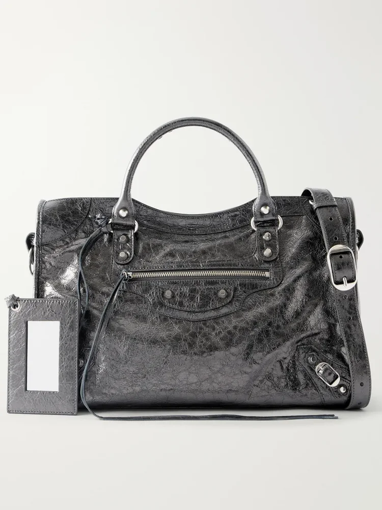 Le City studded leather-trimmed suede shoulder bag