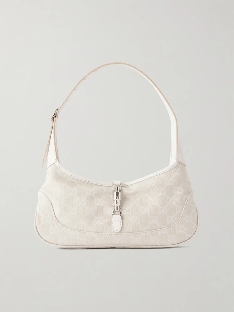 Jackie Slim logo-jacquard leather-trimmed canvas shoulder bag