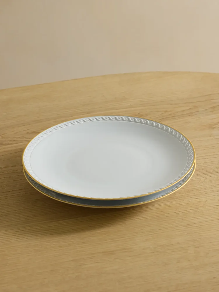 Neptune set of two gold-plated porcelain dinner plates