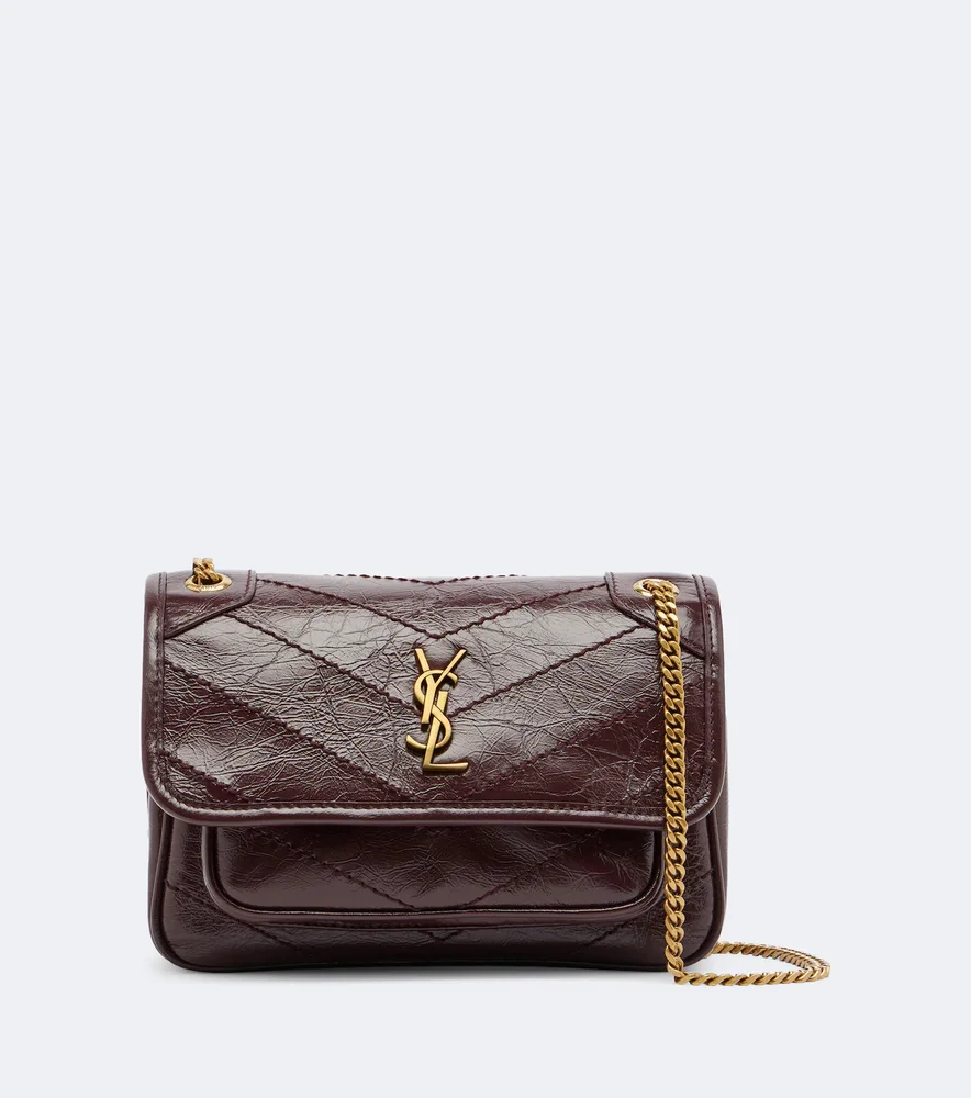 Niki Cassandre Mini leather shoulder bag