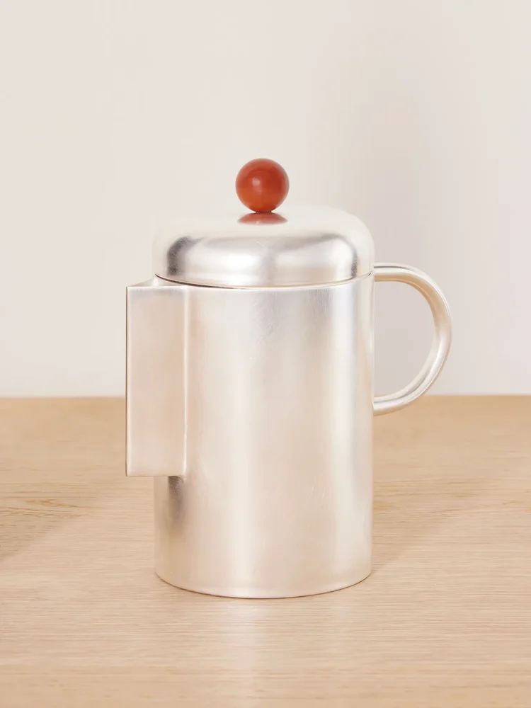 Simple silver-plated and stone coffee pot