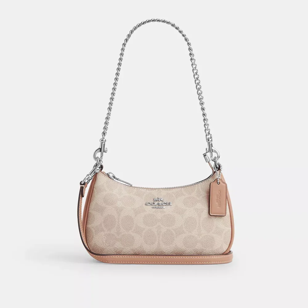 Teri Mini Crossbody Bag In Signature Canvas