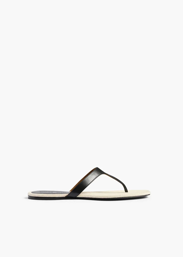 Archer Flat Sandal in Black Leather and Natural Canvas
