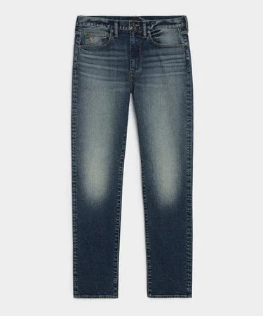 Bootcut creased jean in vintage medium wash