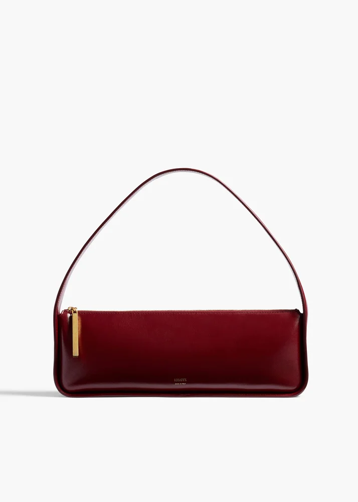 Khaite Lori Baguette Bag in Bordeaux Crackle Patent Leather
