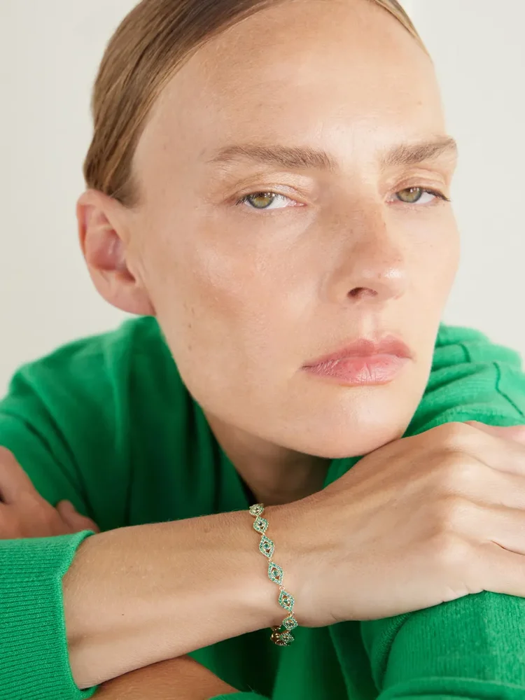 Protective Eye 14-karat gold emerald bracelet
