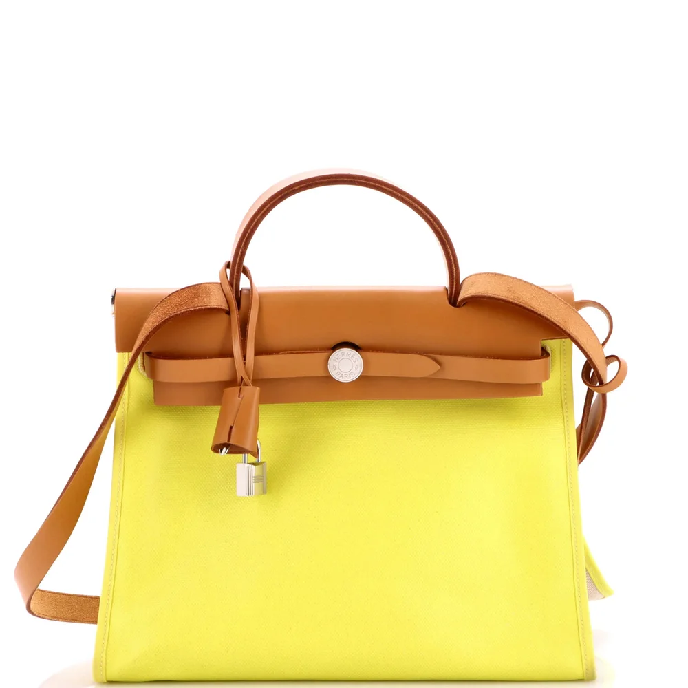 Pre-Owned Herbag Zip Berline Vache Canvas and Leather 31