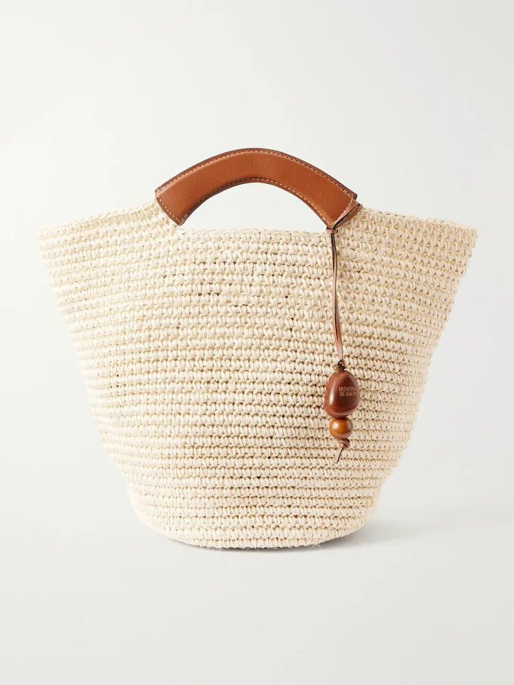 Leather-trimmed raffia tote