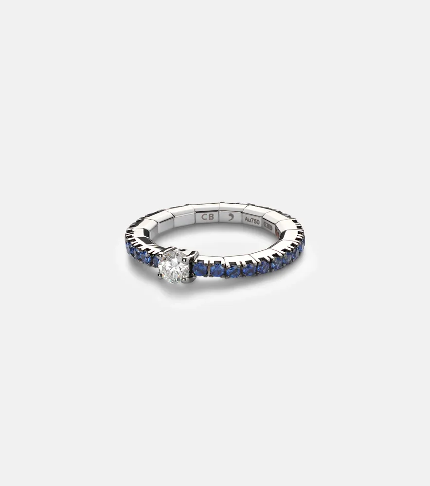 Stretchy 18kt white gold ring with diamond and sapphires