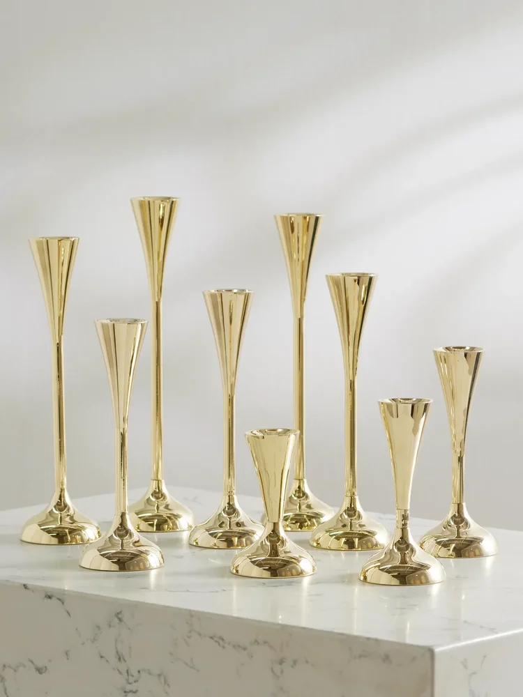 Drip set of nine gold-tone candleholders