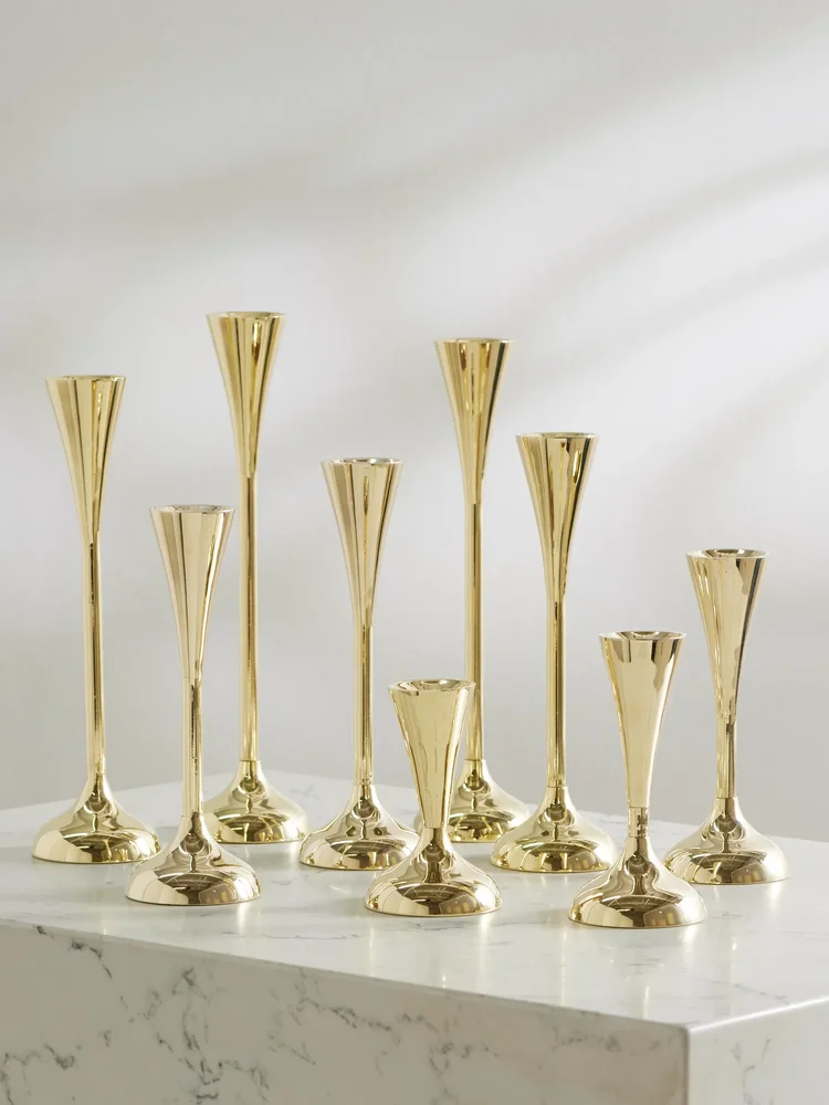 Drip set of nine gold-tone candleholders