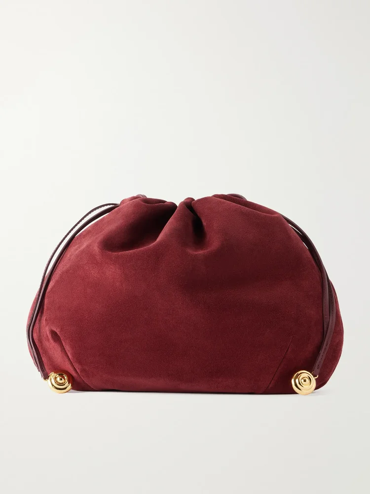 Charm embellished suede clutch