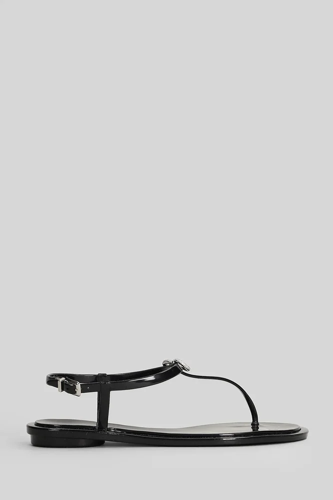 Flat sandal-slipper in black PVC