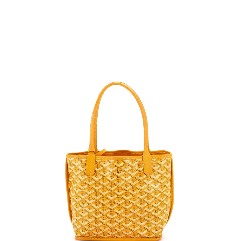 Pre-Owned Anjou Reversible Tote Coated Canvas Mini in Yellow